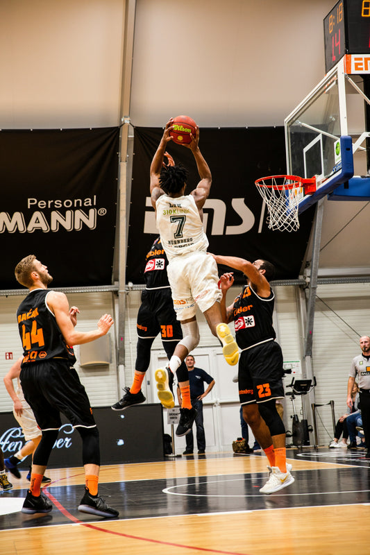 https://unsplash.com/photos/people-playing-basketball-inside-court-oXS1f0uZYV4?utm_content=creditShareLink&utm_medium=referral&utm_source=unsplash